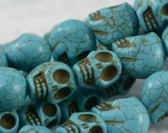 Collier Perles Turquoise Synthèse Et Têtes De Mort - Longueur 39cm Environ 31 Pièces