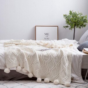 Pom pom throw tesco hotsell