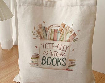 May include: A white canvas tote bag with a design of a pile of books and the text "Tote-ally into books".