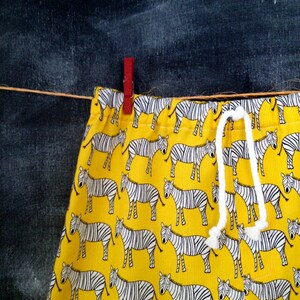 Beach Safari Shorts, Zebra Surfer Shorts, Yellow with Black & White Zebras, 100% Cotton, Back Pockets, Faux Drawstring Cord, Toddler Size 2 image 2