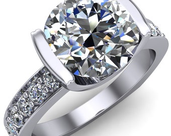 Penelope Round Forever One Moissanite Half Bezel 6 Side Diamond Set Ring
