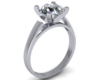 May include: A silver engagement ring with a large, clear, square-shaped diamond.