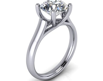 May include: A silver engagement ring with a large, round, clear diamond set in a four-prong setting. The band is thick and has a twisted design.