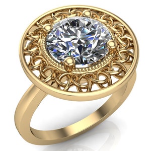 May include: A gold ring featuring a large, round, clear diamond set within a delicate, filigree design.
