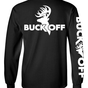 May include: Black long-sleeve shirt with white text and a deer head graphic. The words "BUCK OFF" are printed on the back and down the right sleeve. The deer head graphic is incorporated into the text design.