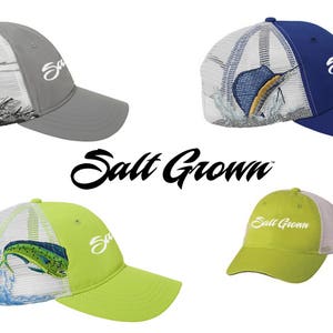 May include: Four different Salt Grown brand baseball caps with mesh back panels. Each cap features a different embroidered design of a fish on the front. The caps are in grey, blue, green, and yellow.