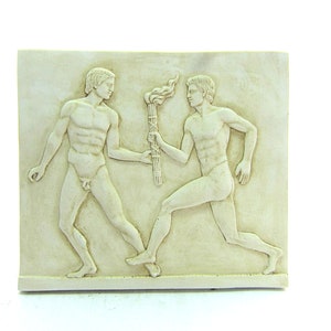 May include: A white plaster relief sculpture of two figures, one passing a torch to the other. The figures are nude and appear to be running.