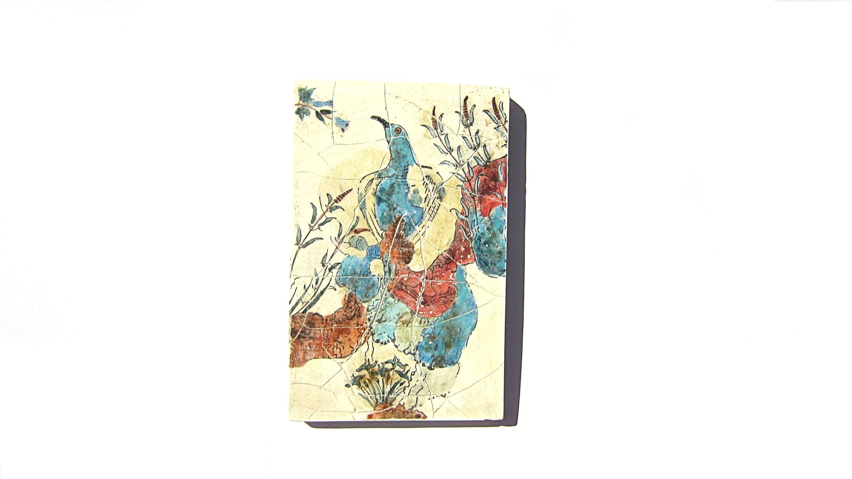 クレタ島のクノッソス宮殿のミノア文明の青い鳥のフレスコ画、彼女への