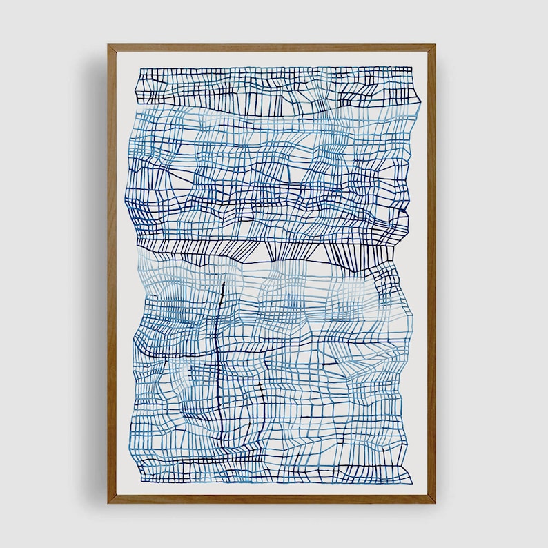 May include: A framed abstract art print featuring a blue and white geometric pattern. The pattern is made up of overlapping lines and squares, creating a textured effect.