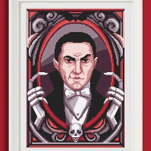 May include: Framed cross-stitch artwork featuring a man in a tuxedo and bow tie, set within a decorative red and black border. The design includes a skull and bat motif.
