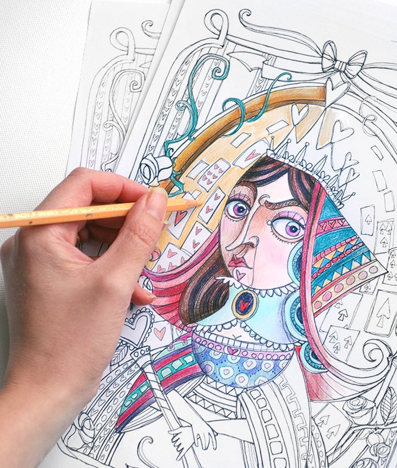 May include: A coloring book page featuring a detailed illustration of the Queen of Hearts from Alice in Wonderland. The queen is wearing a red and blue dress with a crown and a heart-shaped necklace. The background is filled with hearts, playing cards, and other whimsical details.
