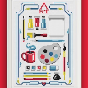 May include: A framed cross-stitch pattern featuring pixel art of art supplies including paint tubes, a palette, brushes, pencils, a red mug with steam, and an ink bottle. The word ART is displayed at the top, and a small heart is at the bottom.