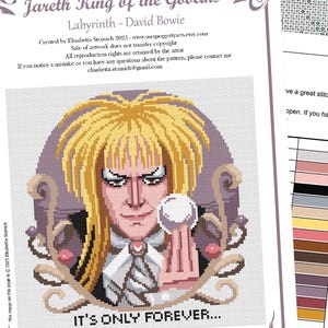May include: Cross stitch pattern featuring a portrait of Jareth, the Goblin King from the movie Labyrinth, with the text "It's Only Forever..." below. The pattern is in a purple and gray color scheme.