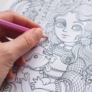 May include: A black and white line drawing of a girl with long hair holding a dog. The girl is wearing a dress with a checkered pattern. The dog is looking up at the girl. The drawing is on a white background.