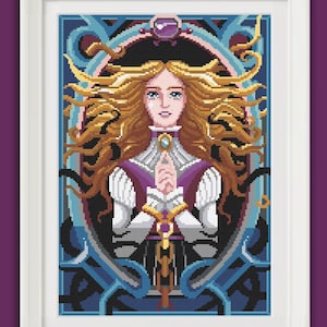 May include: A cross-stitch pattern featuring a woman with long blonde hair, wearing a white and purple dress, holding a blue gem. The background is a dark blue and teal art nouveau design.