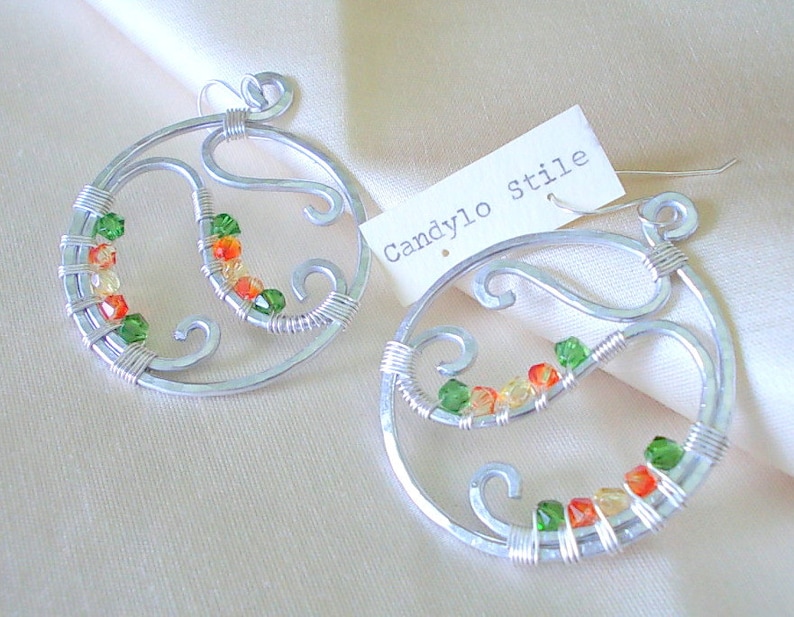 Hoop earrings handmade with hammered aluminum and faceted beads