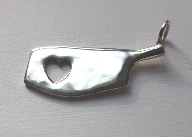 Sterling silver pendant of a rowing blade with a heart cut out Etsy