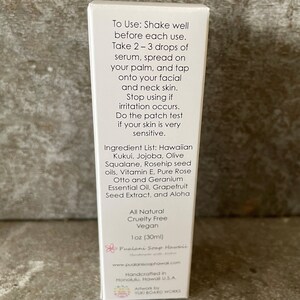 May include: A white product box with text detailing usage instructions and ingredients, including Hawaiian Kukui and Rosehip seed oils. The box is labeled "All Natural, Cruelty Free, Vegan" and contains 30ml of product. The brand name is Pualani Soap Hawaii.