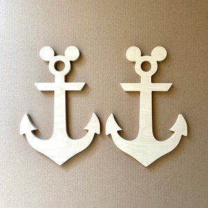 May include: Two wooden anchors with Mickey Mouse ears. The anchors are unfinished and ready to be painted.