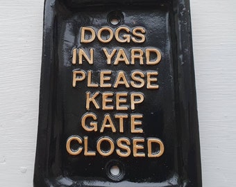 Dogs in yard please keep gate  closed