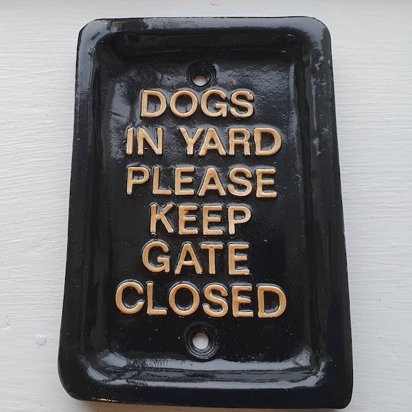 Dogs in yard please keep gate  closed