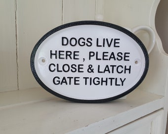 Dogs Live here , Please latch and close gate tightly