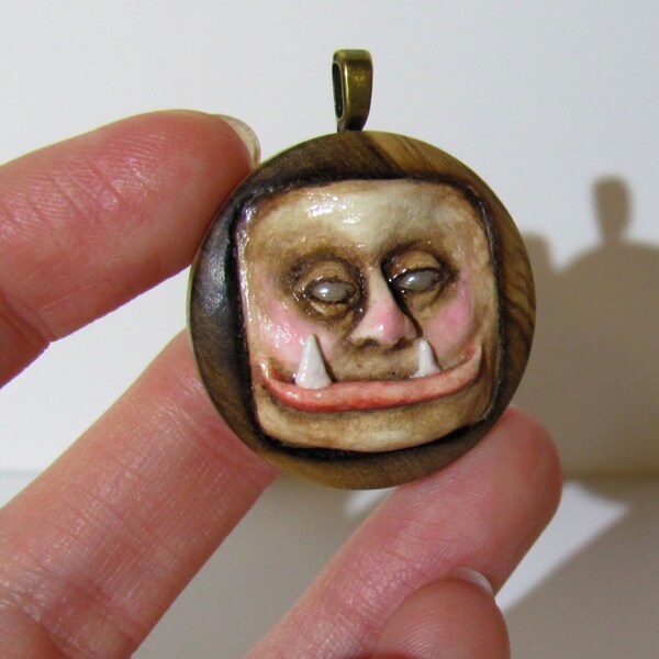 Grinning Ogre Pendant Necklace, Clay Face Set in Wood