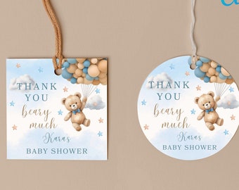 May include: Two baby shower gift tags. One is square, the other is round. Both feature a teddy bear floating with balloons, clouds, and stars. Text reads "Thank you beary much Karas BABY SHOWER". The tags are editable with Canva.