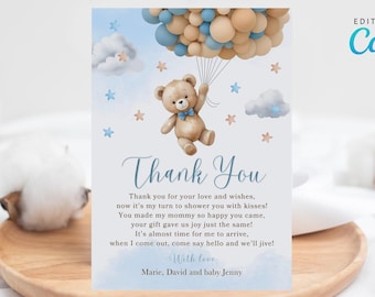 May include: A blue and beige baby shower thank you card featuring a teddy bear holding balloons. The card reads "Thank You" and includes a message expressing gratitude for guests' love and wishes. The card is editable using Canva.