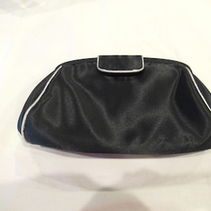 Le Regale black satin purse with silver trim, c. 1980s