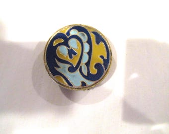 Estuche compacto de esmalte azul y amarillo de Estée Lauder, década de 1980