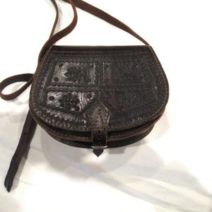 Mexican tooled dark brown tooled leather purse, c. 1970s