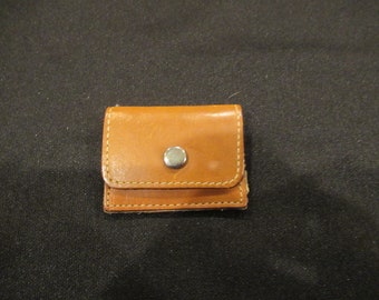 Brown leather coin purse change purse, designed to go on a belt, c. 1970s