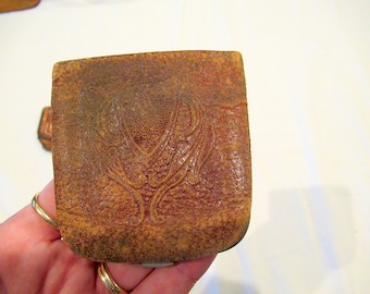 1920s-era tooled leather coin purse, inner pocket, clasp closure, Art Deco