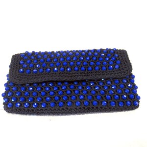 The Emporium black clutch with blue beads, made in Italy, c. 1970s