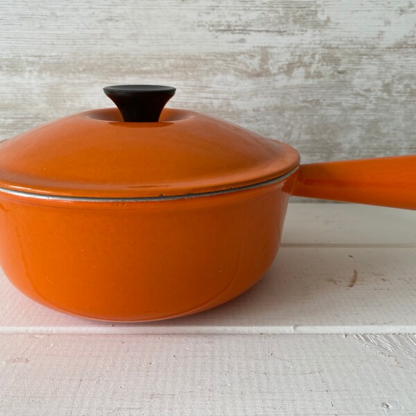 Vintage Le Creuset Sauce pan in the Iconic Volcanic Orange 1970's Classic Cookware. Size 20 with lid.