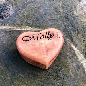 Wooden heart shaped wooden puzzle box