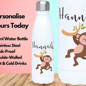 May include: A white stainless steel water bottle with a monkey graphic and the name "Hannah" printed on it. The bottle is 500 ml and is double-walled, leak-proof, and suitable for hot and cold drinks.
