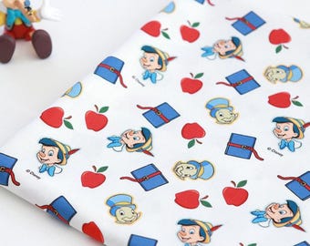 Disney Pinocchio Cotton Fabric by the Yard, Apple Character Print, 44 Inches Wide