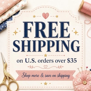 May include: A cream-colored sign with a scalloped edge features the dark blue text FREE SHIPPING on U.S. orders over $35 and Shop more & save on shipping. The sign is decorated with small gold stars, a pink stitched heart, and floral fabric.