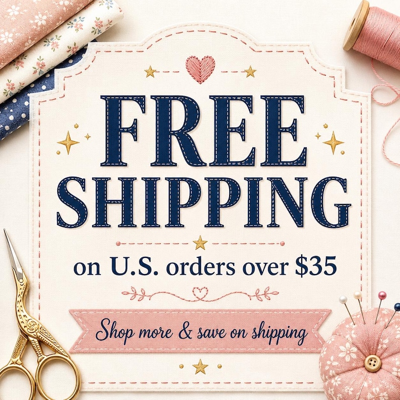 May include: A cream-colored sign with a scalloped edge features the dark blue text FREE SHIPPING on U.S. orders over $35 and Shop more & save on shipping. The sign is decorated with small gold stars, a pink stitched heart, and floral fabric.