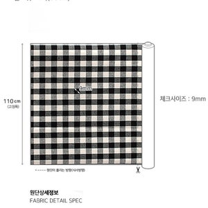 May include: A roll of black and white checkered fabric. The fabric is 110 cm wide with 9mm checks. The text "FABRIC DETAIL SPEC" is visible. The fabric is suitable for various sewing and crafting projects.