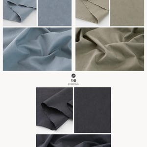 May include: A collection of fabric swatches in three distinct colors labeled 29 Blue Gray, 30 Dusty, and 31 Charcoal. Each section displays the textile folded to show texture and flat to show the solid color, featuring raw edges and matte finish.