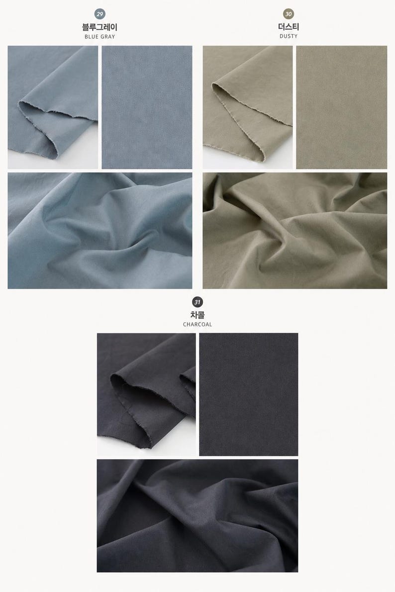 May include: A collection of fabric swatches in three distinct colors labeled 29 Blue Gray, 30 Dusty, and 31 Charcoal. Each section displays the textile folded to show texture and flat to show the solid color, featuring raw edges and matte finish.
