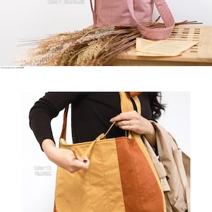 May include: A dusty rose drawstring bucket bag with a shoulder strap and a mustard yellow and burnt orange color-blocked tote bag featuring vertical stitching, a drawstring closure, and a wide shoulder strap for carrying over the shoulder.