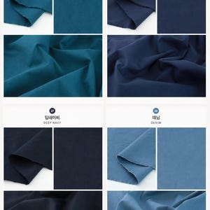 May include: A collection of four fabric swatches labeled 25 Turkey Green, 26 Navy, 27 Deep Navy, and 28 Denim. Each section displays the textile in a folded, draped state and a flat, smooth state, showcasing the solid colors and matte texture.