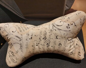 Reading bones made from music note fabric