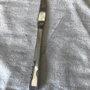 Vintage Stainless and silverplate ornate butter knife