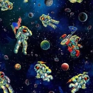 Könnte beinhalten: Ein blauer und schwarzer Stoff mit Weltraumthema und einem sich wiederholenden Muster aus Astronauten, Planeten und Sternen.