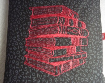 Book bag padded and embroidered book cover protective book sleeve reading books stacked